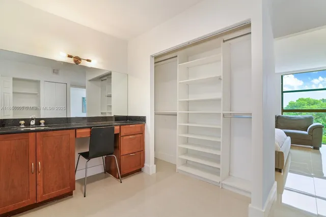 a room with furniture and a window