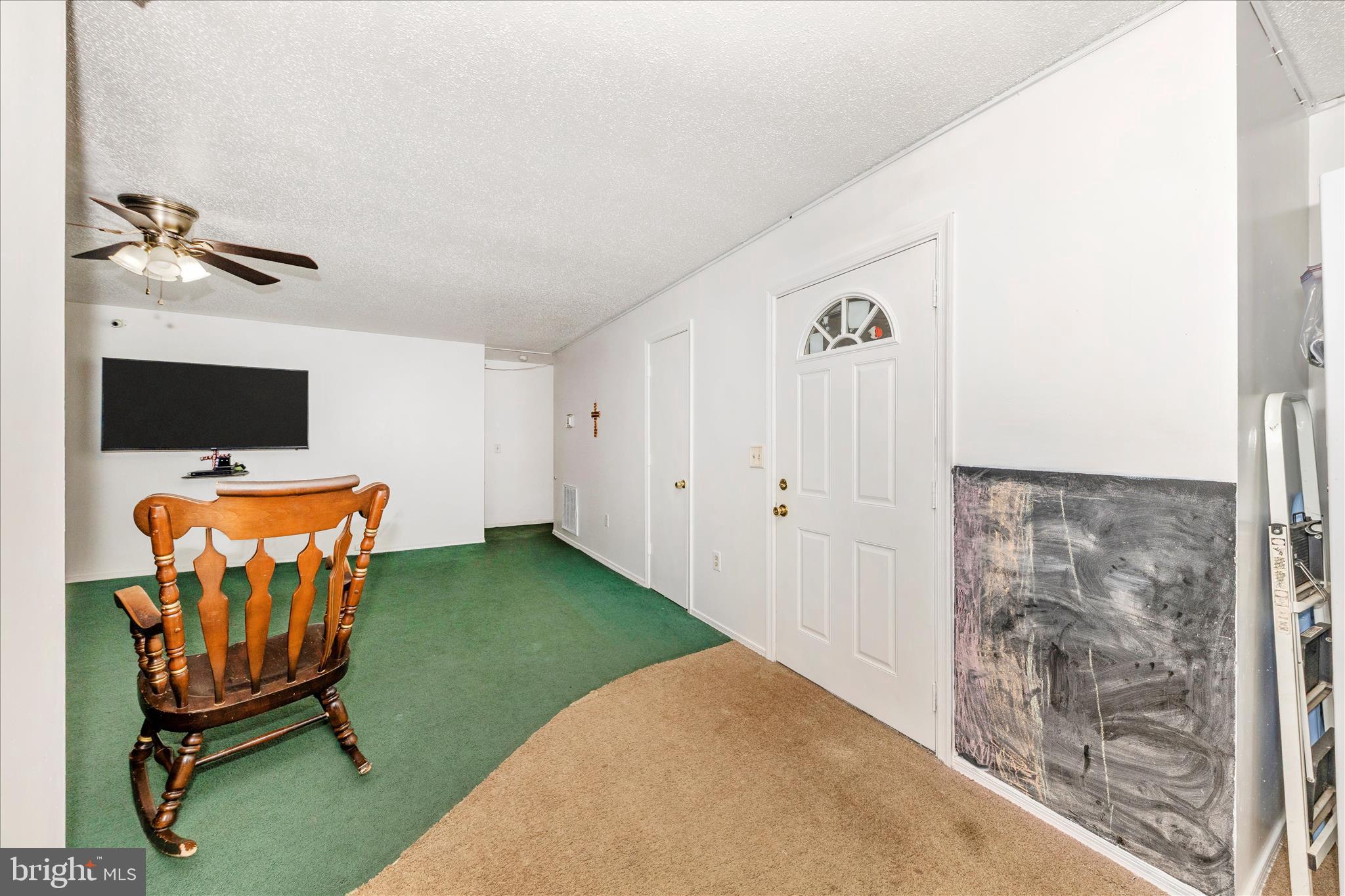 2915 Fry Road Jefferson, MD 21755 - Photo 11 of 66 a room with furniture and flat screen tv