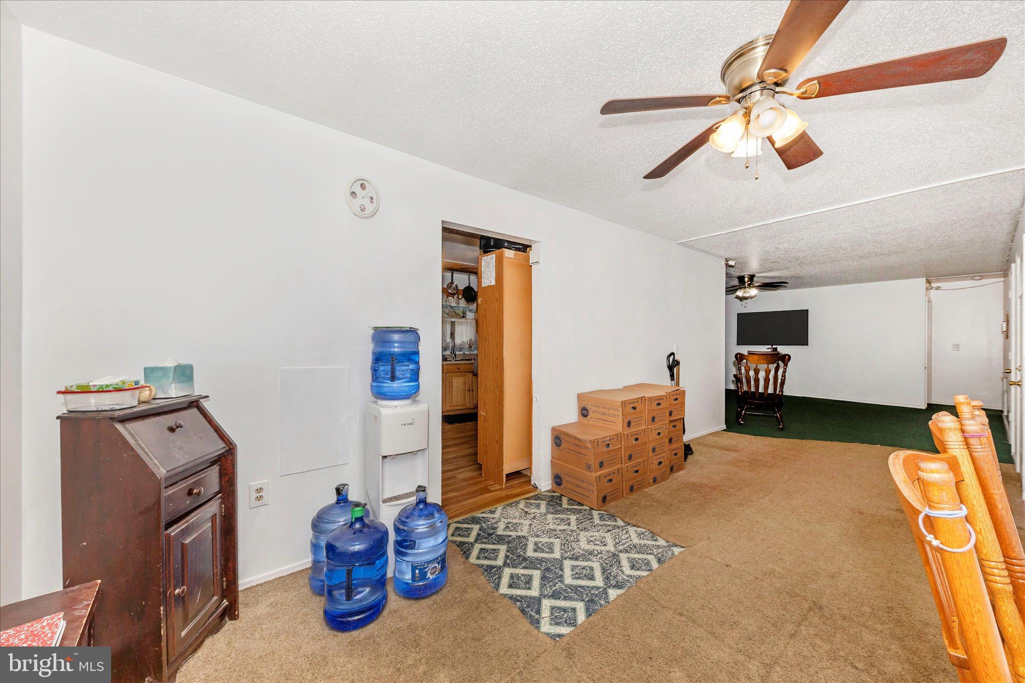2915 Fry Road Jefferson, MD 21755 - Photo 14 of 66 a bedroom with furniture and a chandelier