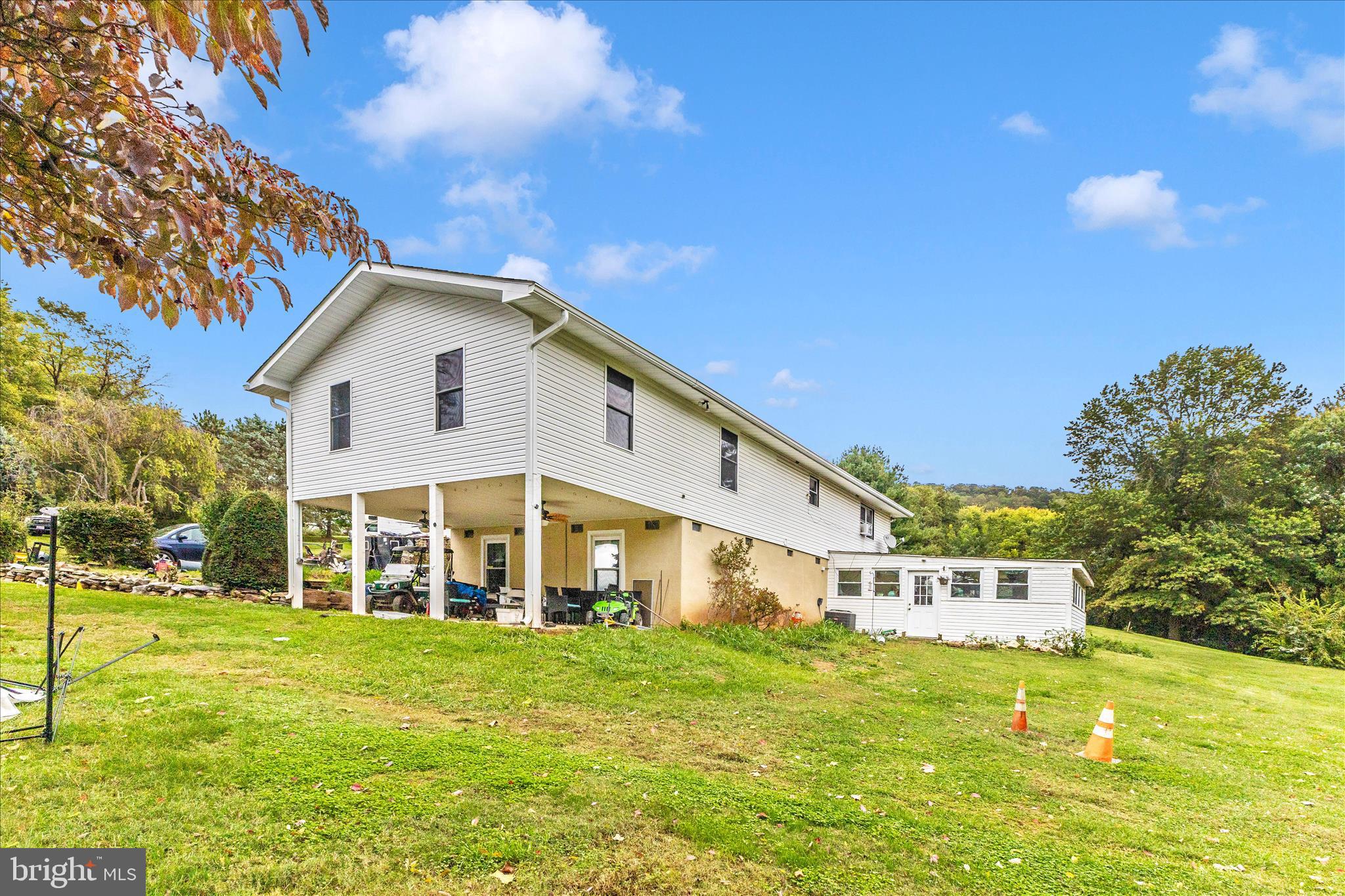 2915 Fry Road Jefferson, MD 21755 - Photo 56 of 66 a view of a white house with a big yard and large trees