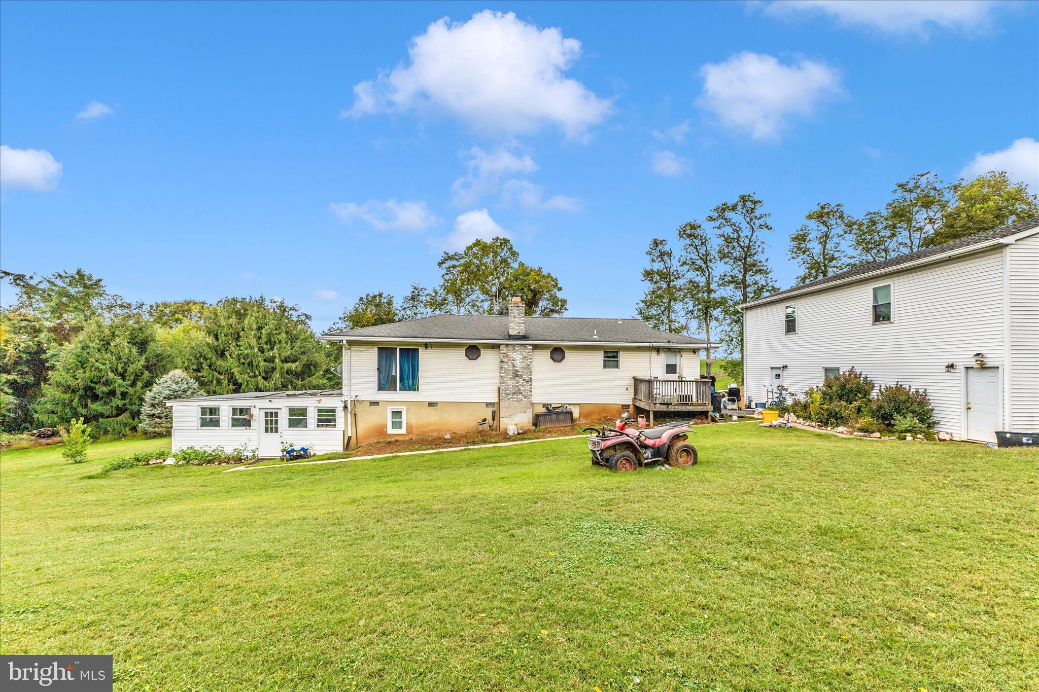 2915 Fry Road Jefferson, MD 21755 - Photo 57 of 66 a view of a house with a big yard and potted plants