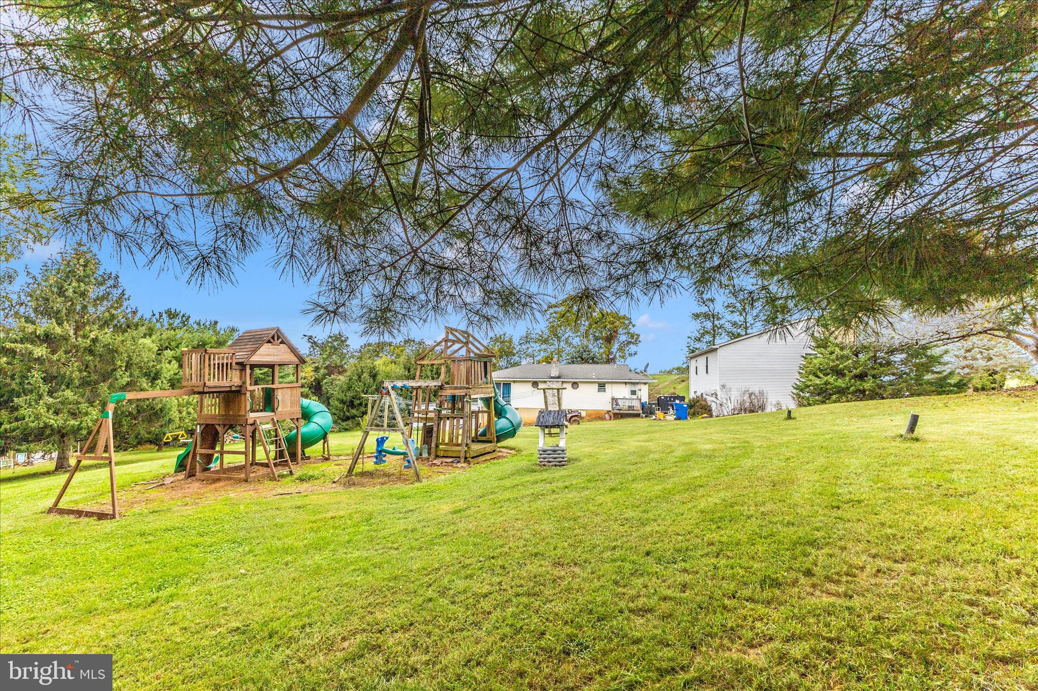 2915 Fry Road Jefferson, MD 21755 - Photo 59 of 66 a view of swimming pool with lawn chairs and plants