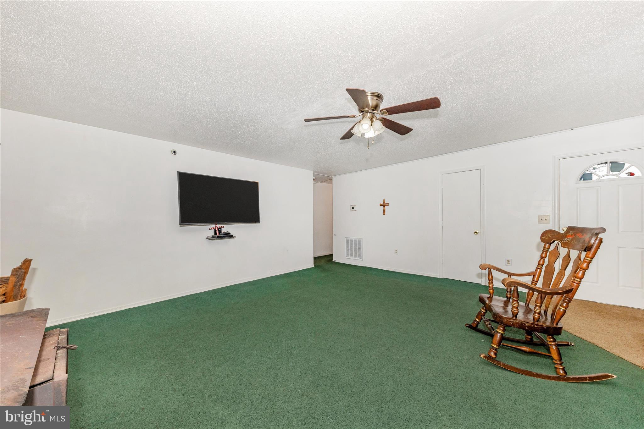 2915 Fry Road Jefferson, MD 21755 - Photo 10 of 66 a living room with furniture and a flat screen tv
