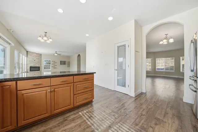 a large bathroom with a sink and a mirror