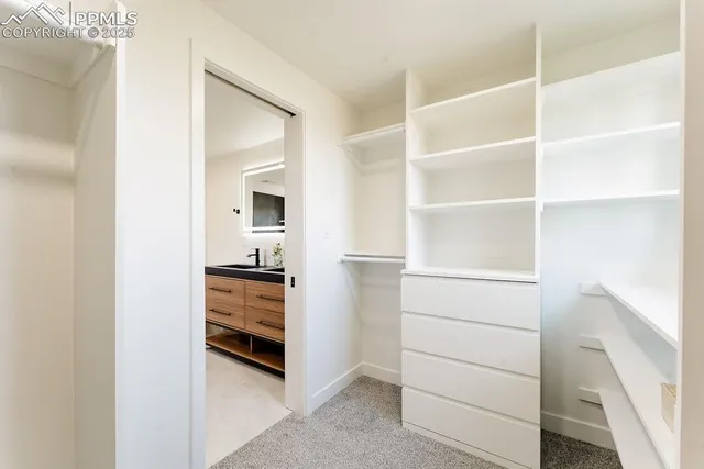 a view of an empty walk in closet