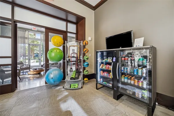 a room with furniture and a flat screen tv
