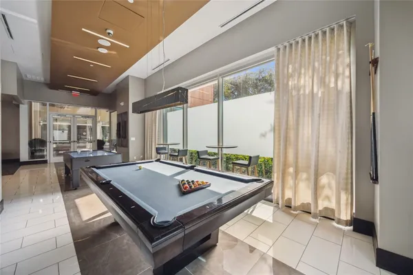 a living room with hard wood floor