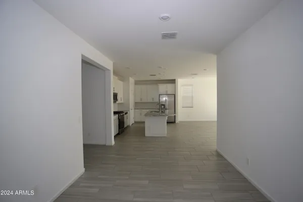 a view of a kitchen with a sink