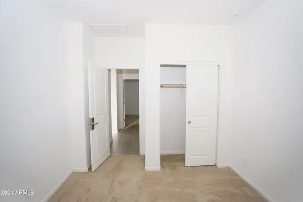 an empty room with closet