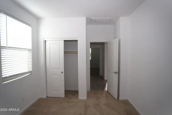 a view of an empty room with window