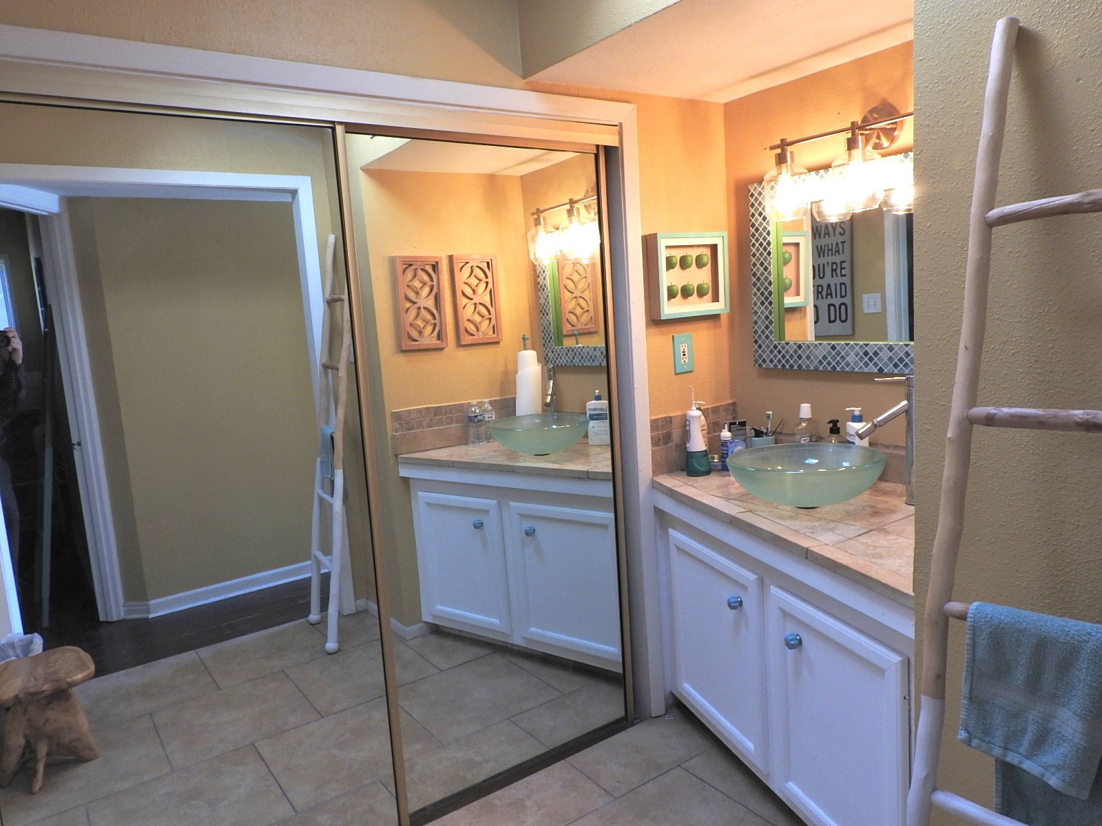 7047 Bissonnet Street, Unit 44 Houston, TX 77074 - Photo 13 of 20 a bathroom with a granite countertop sink and mirror