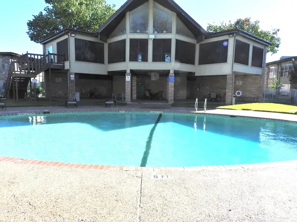 a house view with a outdoor space