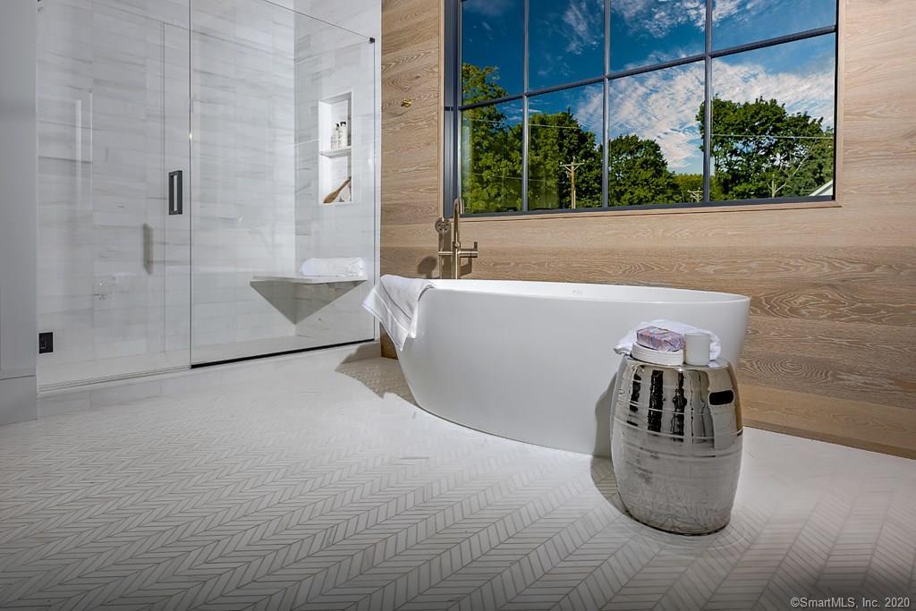 1 Deerfield Road Darien, CT 06820 - Photo 23 of 40 a view of a bathtub in a bathroom