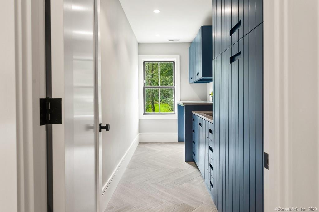 1 Deerfield Road Darien, CT 06820 - Photo 31 of 40 a kitchen with a refrigerator