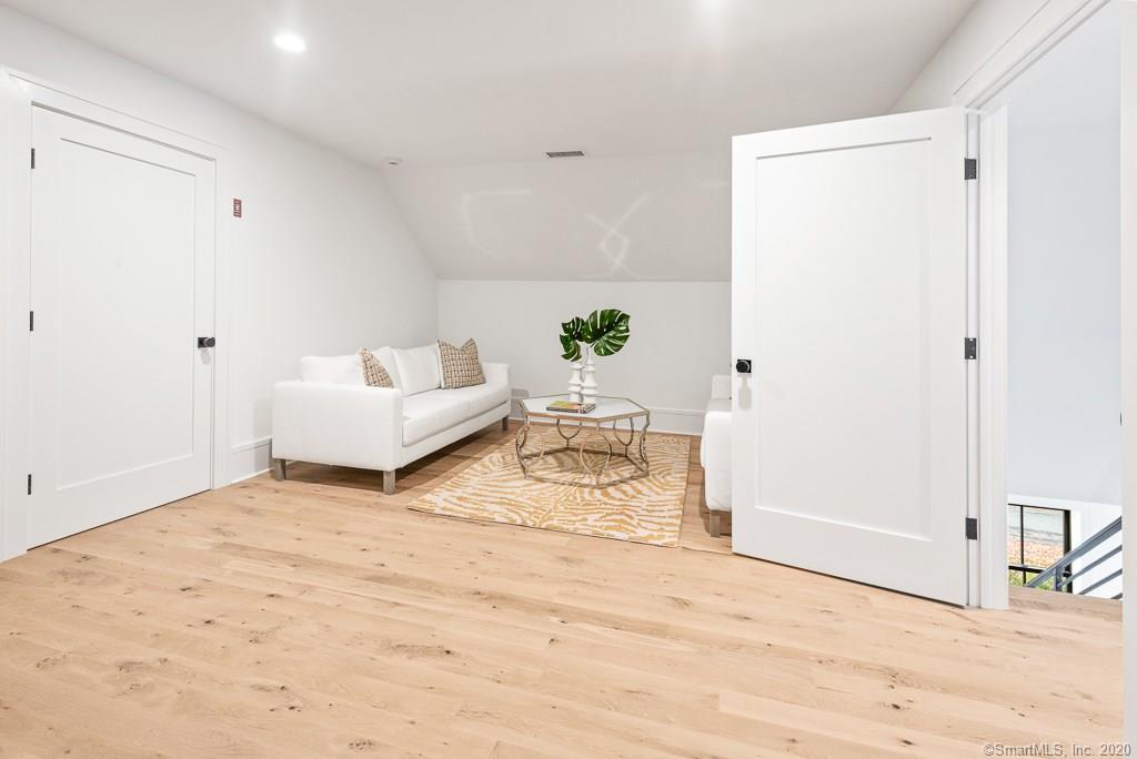 1 Deerfield Road Darien, CT 06820 - Photo 33 of 40 a room with a bed and a window