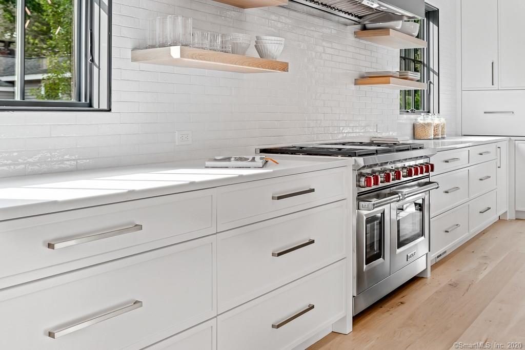 1 Deerfield Road Darien, CT 06820 - Photo 5 of 40 a kitchen with a stove and a sink