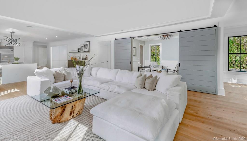 1 Deerfield Road Darien, CT 06820 - Photo 10 of 40 a living room with furniture and a wooden floor