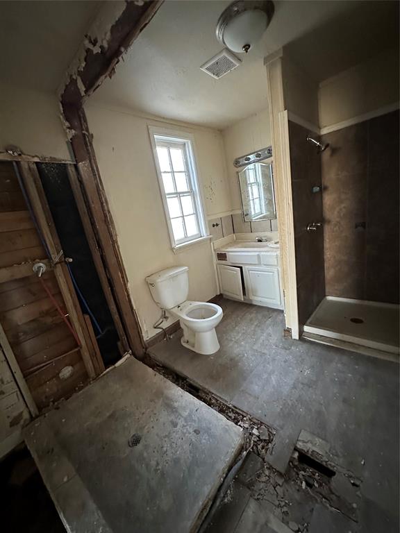 115 1st Street Terrell, TX 75160 - Photo 8 of 9 a bathroom with a sink toilet and shower
