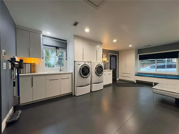 a view of a livingroom with furniture and window