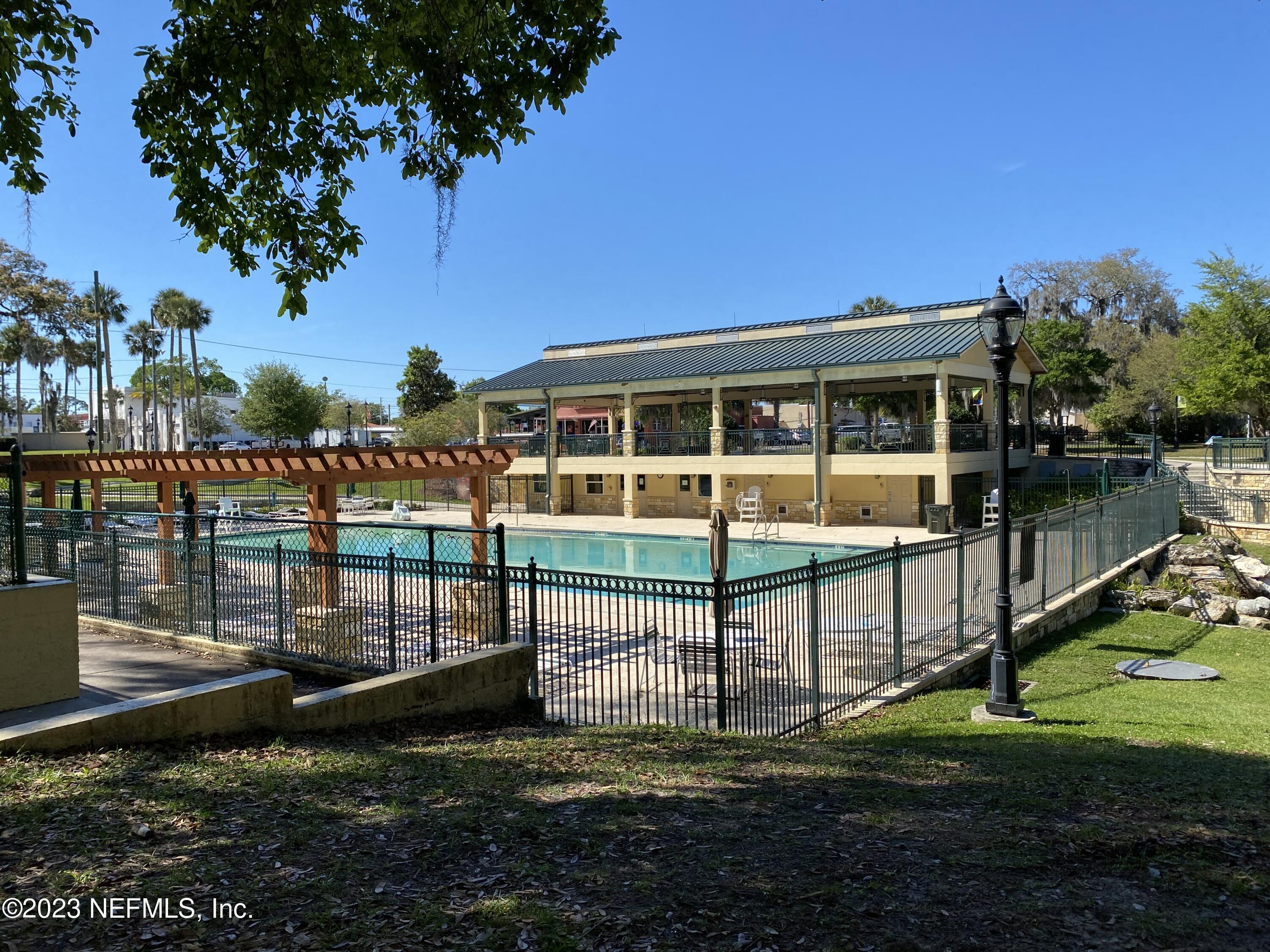 102 St Elmo Road Green Cove Springs, FL 32043 - Photo 2 of 15 a view of a house with backyard and porch