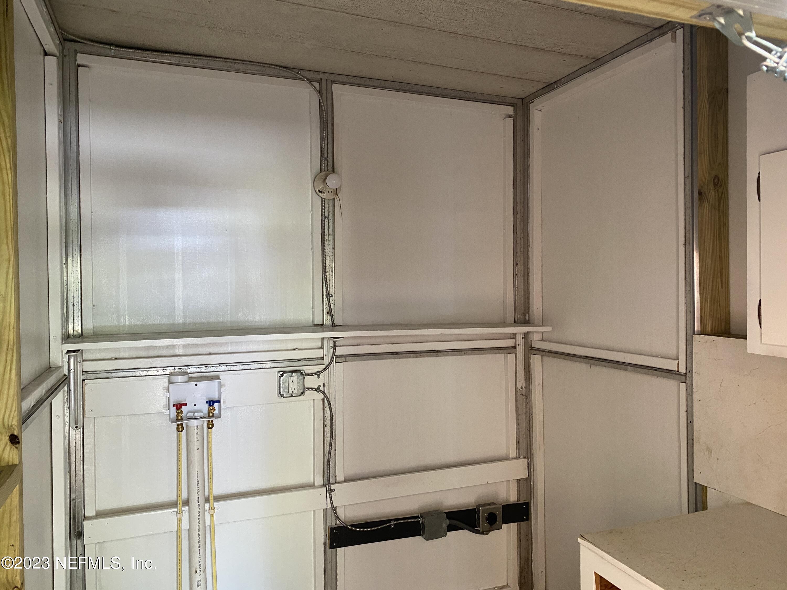 102 St Elmo Road Green Cove Springs, FL 32043 - Photo 4 of 15 a view of a walk in closet