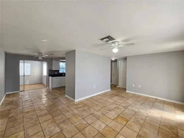 a view of a livingroom with a ceiling fan