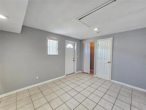 a view of an empty room and window