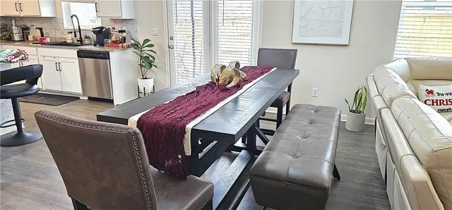 a bed room with furniture and a window