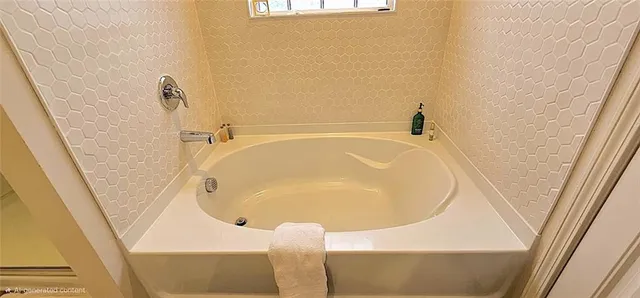 a bathroom with a tub