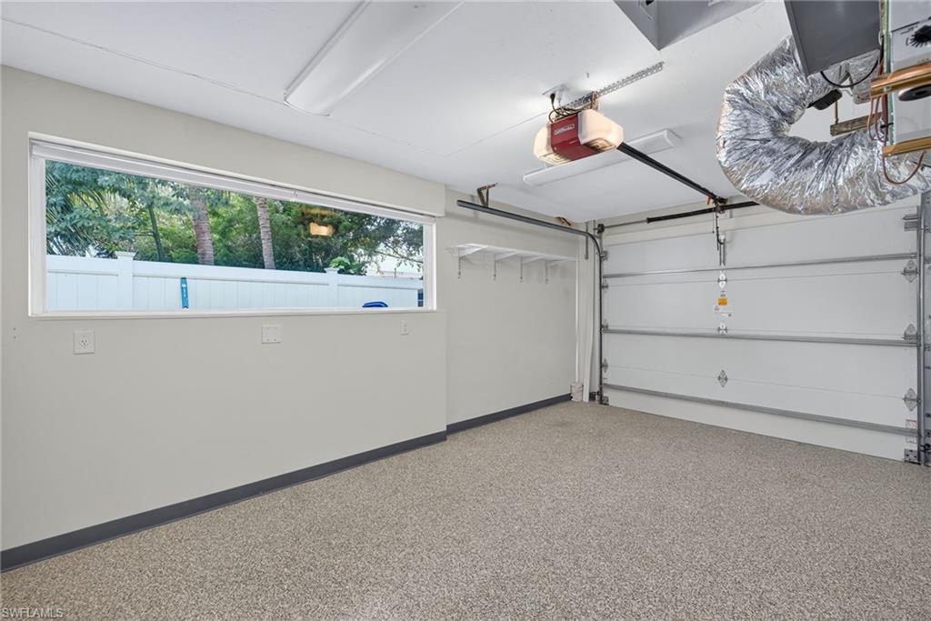 1135 7th Street South Naples, FL 34102 - Photo 28 of 35 a view of a livingroom with toys