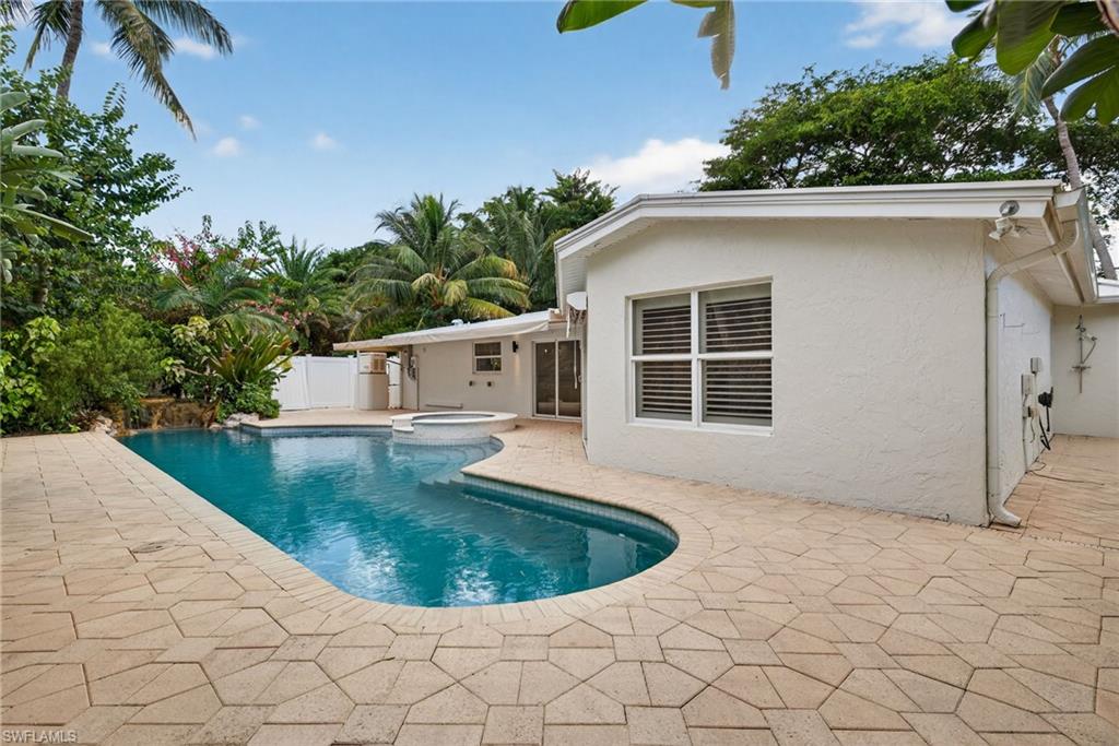 1135 7th Street South Naples, FL 34102 - Photo 31 of 35 a house view with a outdoor space
