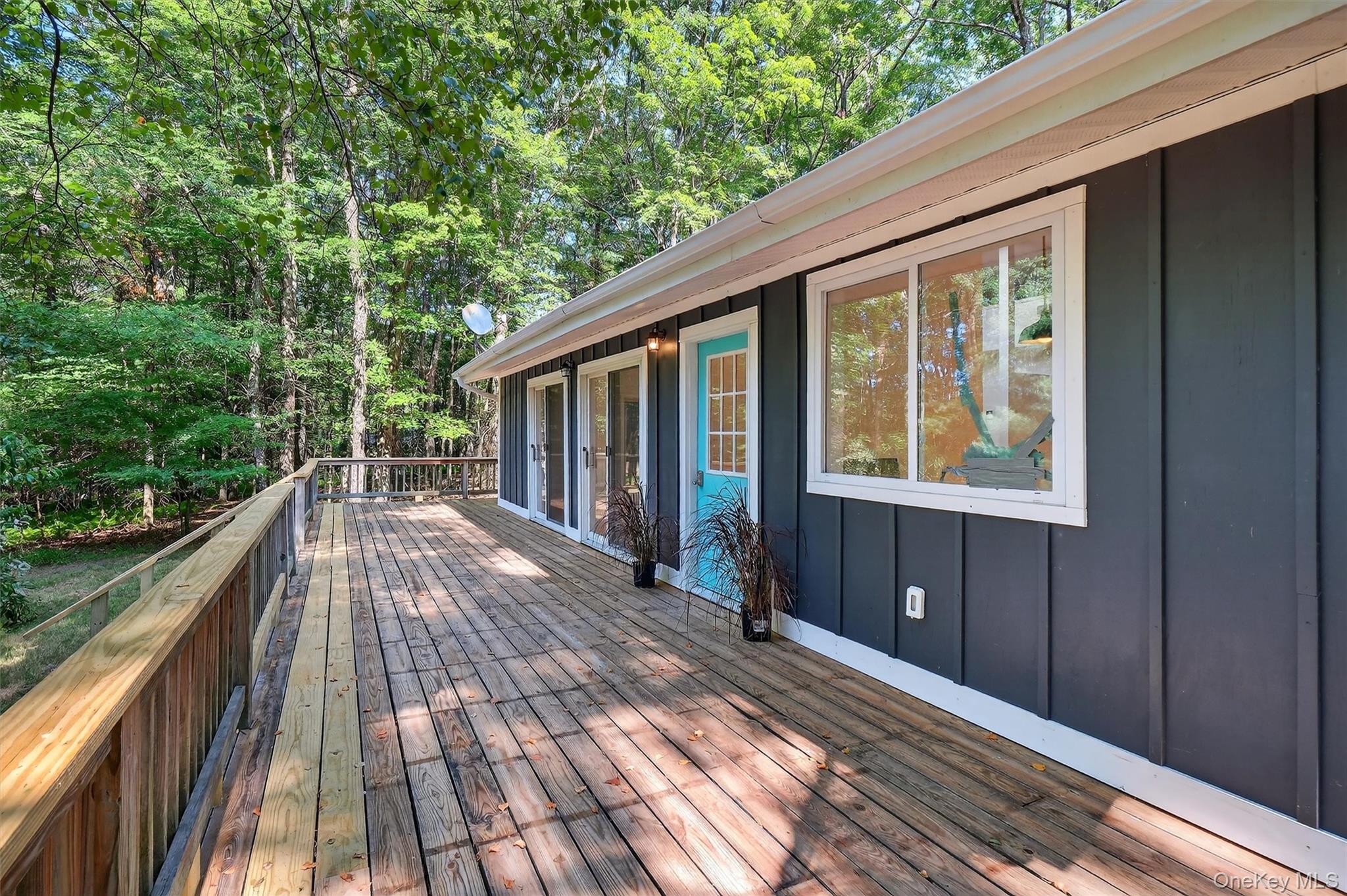 a view of balcony and wooden floor