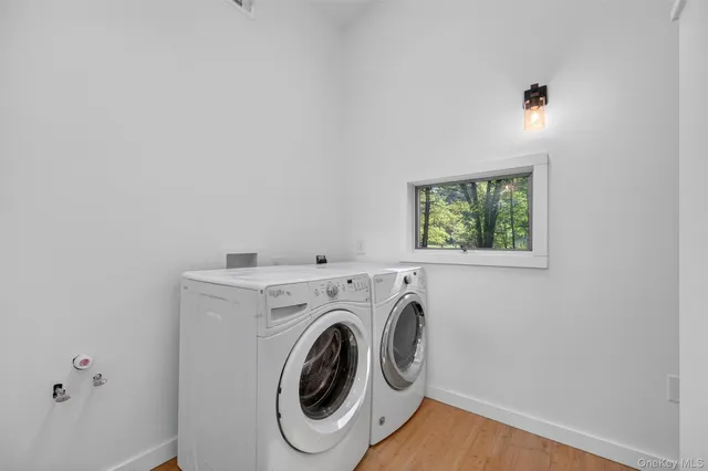 a utility room with dryer and washer