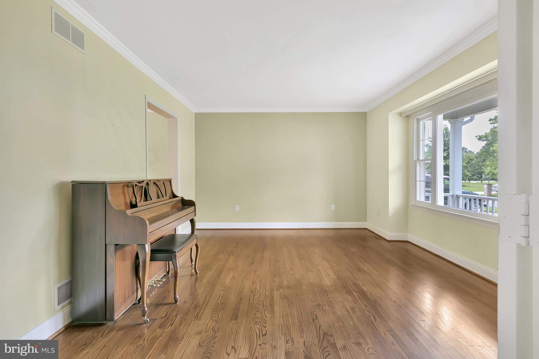 10 New Haven Drive Newark, DE 19713 - Photo 14 of 27 a view of room with window and wooden floor