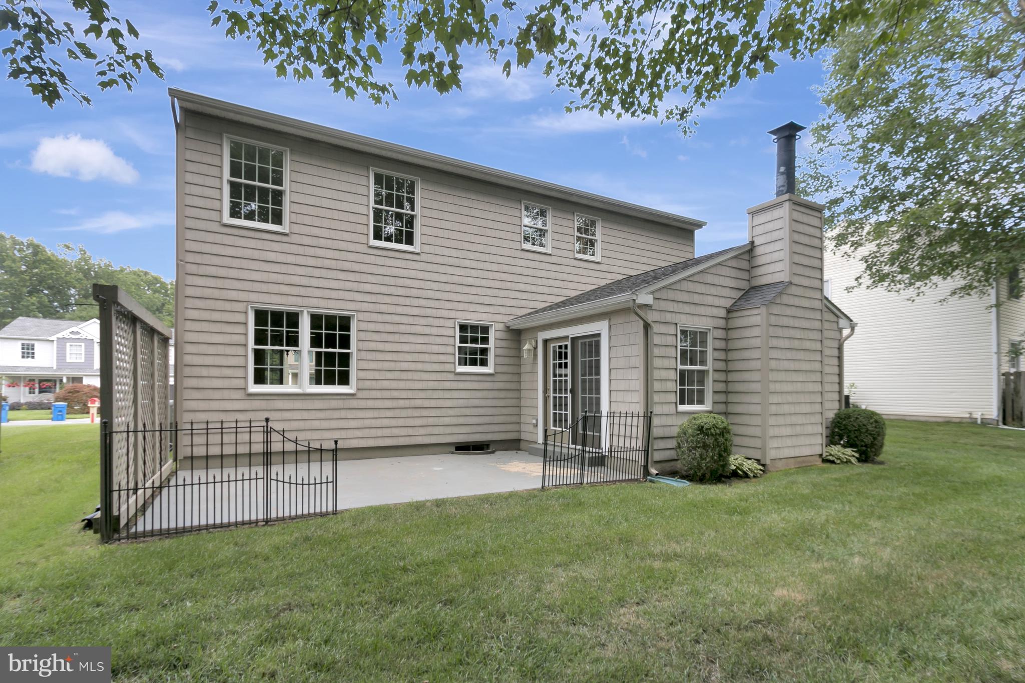 10 New Haven Drive Newark, DE 19713 - Photo 5 of 27 a view of a house with a backyard