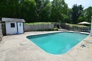 428 Putnam Hill Road Sutton, MA 01590 - Photo 16 of 42 a view of a backyard with swimming pool