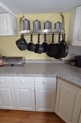 428 Putnam Hill Road Sutton, MA 01590 - Photo 20 of 42 a close view of a sink and a stove with kitchen countertops