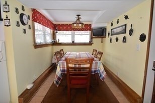428 Putnam Hill Road Sutton, MA 01590 - Photo 22 of 42 a view of a hallway with furniture and windows