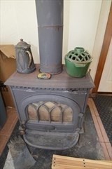 428 Putnam Hill Road Sutton, MA 01590 - Photo 25 of 42 a room with a fireplace and painted walls