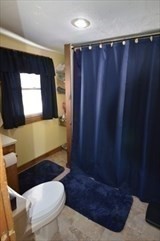 428 Putnam Hill Road Sutton, MA 01590 - Photo 29 of 42 a bathroom with a sink and a mirror