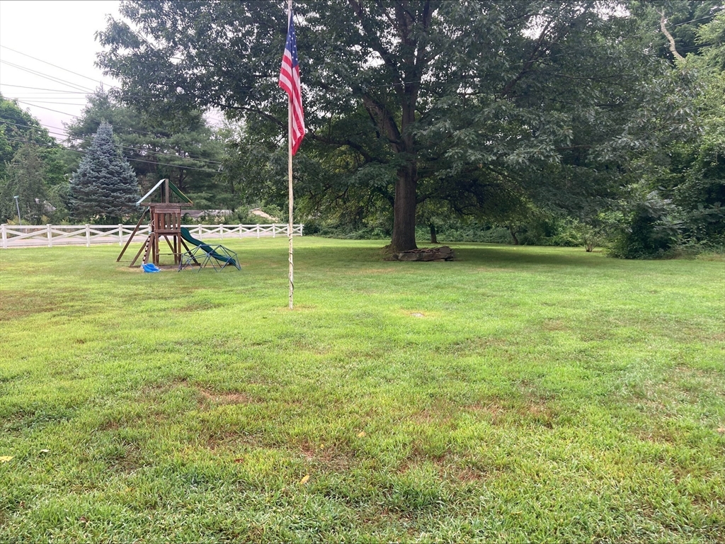 428 Putnam Hill Road Sutton, MA 01590 - Photo 42 of 42 a view of a yard with a slide