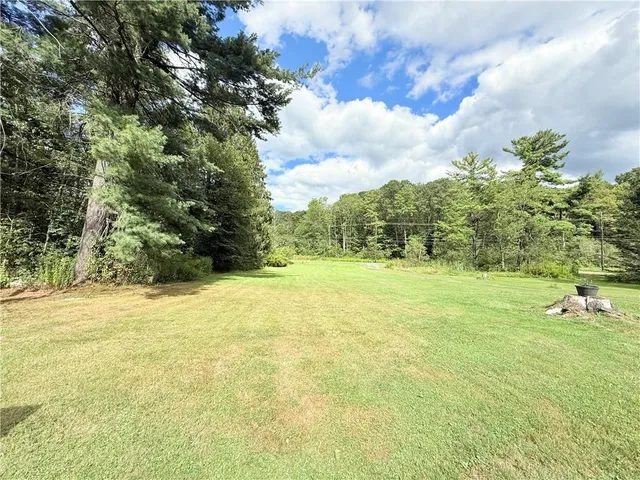 a view of an outdoor space and a yard
