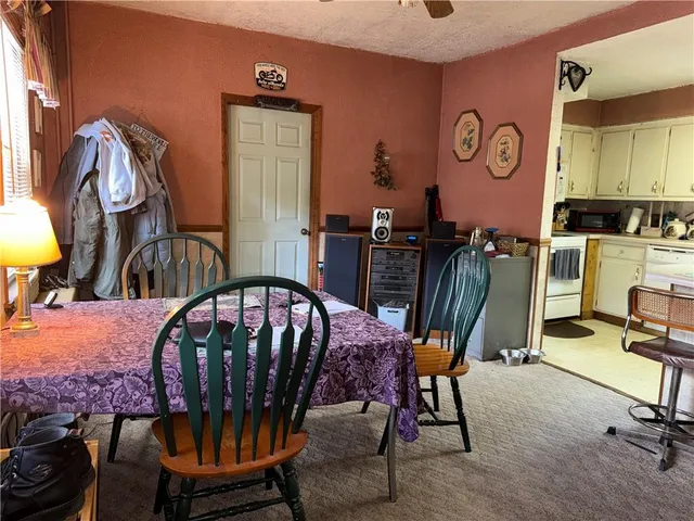 a view of a livingroom with furniture and furniture
