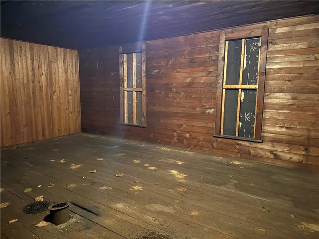 a view of a brick house with a street