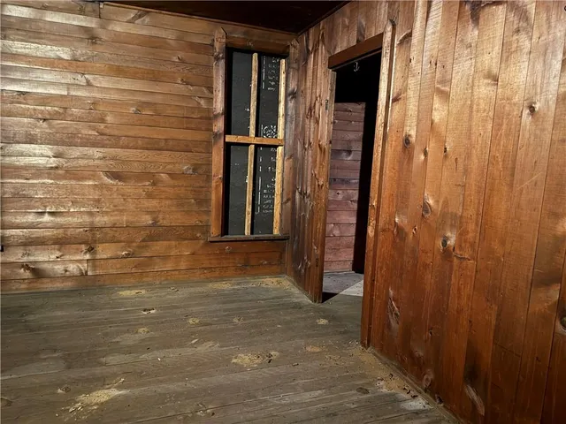 a view of a door and wooden door