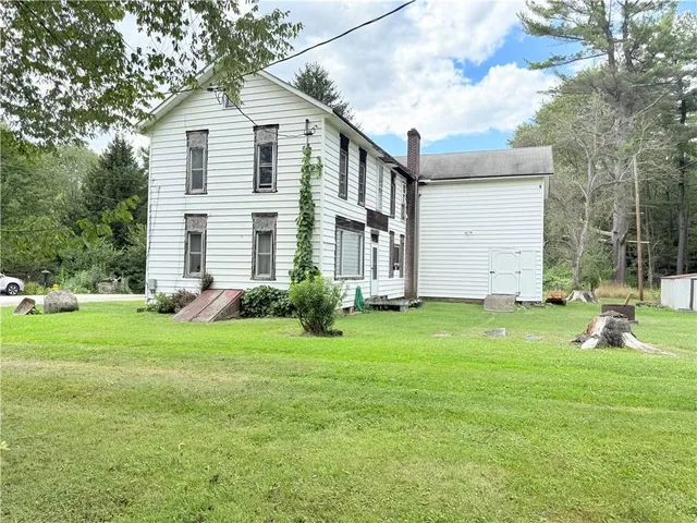 a house view with a garden space