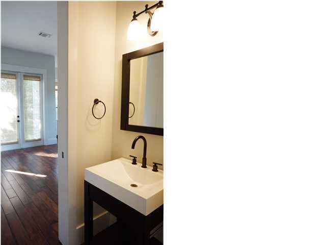 128 Marlin Street Santa Rosa Beach, FL 32459 - Photo 11 of 21 a bathroom with a sink a mirror and a vanity