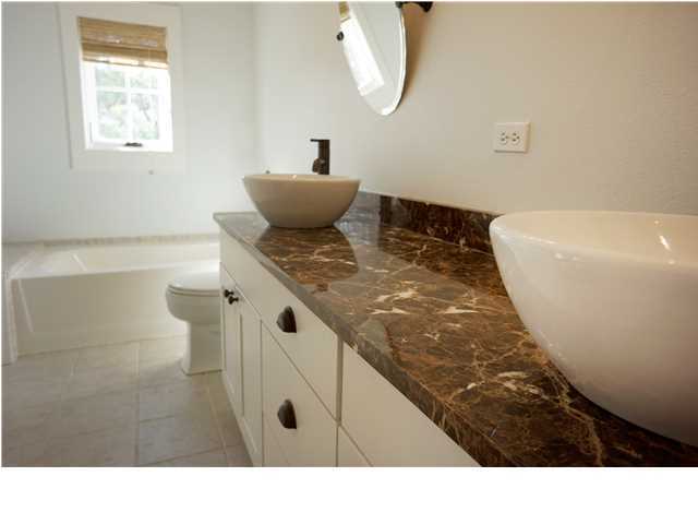 128 Marlin Street Santa Rosa Beach, FL 32459 - Photo 14 of 21 a view of bathroom with bathtub and mirror