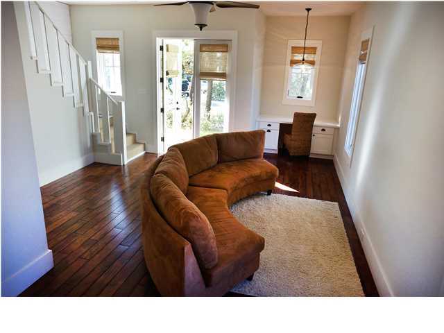 128 Marlin Street Santa Rosa Beach, FL 32459 - Photo 4 of 21 a living room with furniture and a fireplace