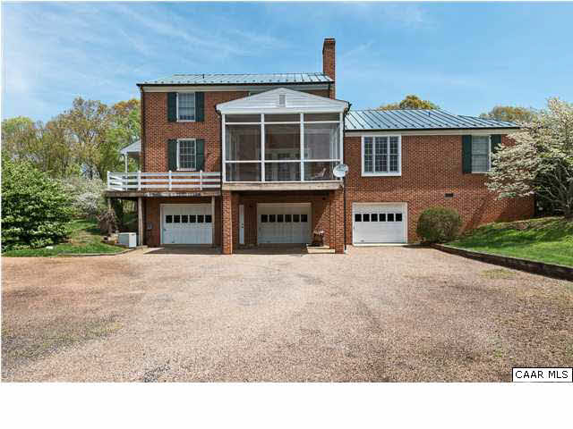 4650 Pelham Road Earlysville, VA 22936 - Photo 19 of 21 The circular drive extends around the back of the house and offers plentiful parking. The oversize three bay garage is pristine.